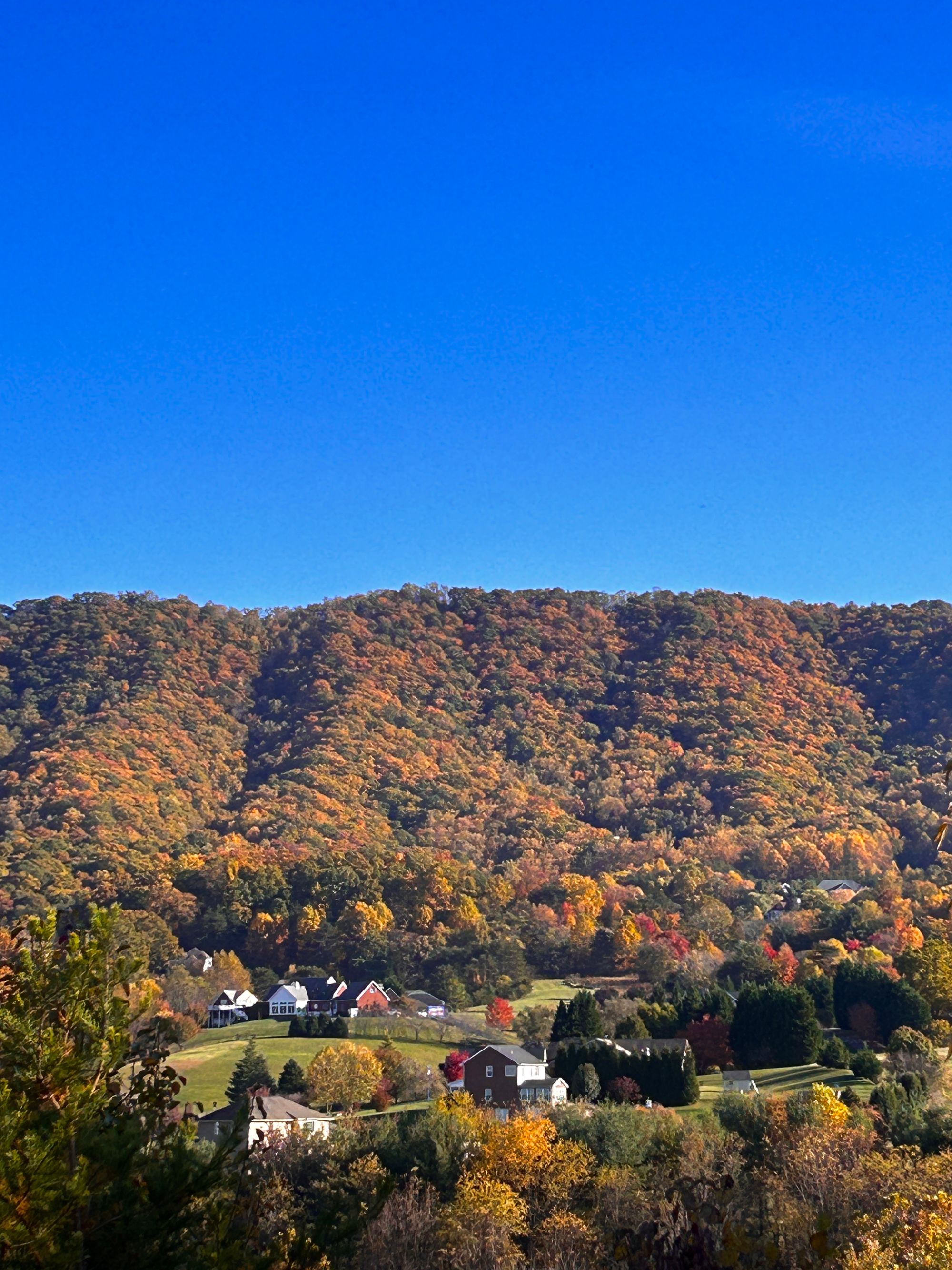 autumn mountains with little houses.