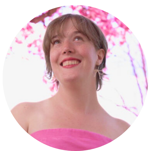 me! In a pink dress with pink flowers in the background